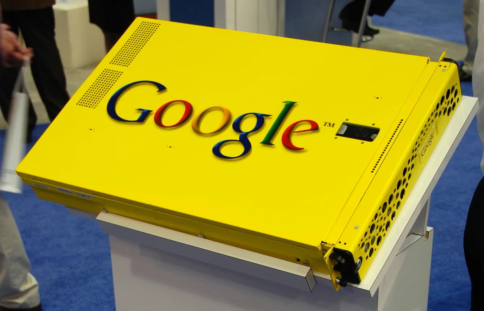 A Google Search Appliance on a display stand: a bright yellow rack-mount server with the Google logo on its lid.